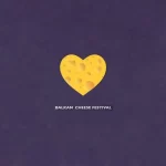 Najava za Balkan Cheese Festival. Ljubičasta pozadina sa sirom u obliku srca.