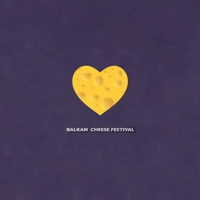 Najava za Balkan Cheese Festival. Ljubičasta pozadina sa sirom u obliku srca.