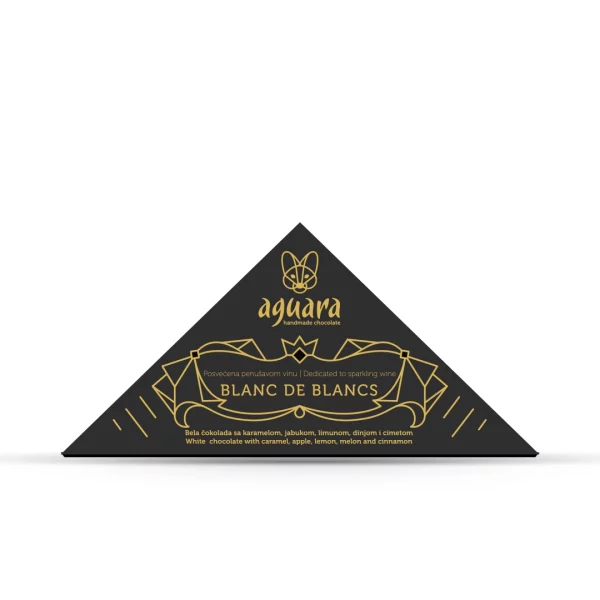 Trouglasta čokolada čokoladeposvećene vinu Blanc de Blancs. Na ambalaži se nalaze linijski elementi koji predstavljaju elemente srpske tradicije.