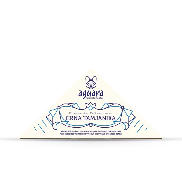 Trouglasta čokolada čokoladeposvećene vinu Crna tamjanika. Na ambalaži se nalaze linijski elementi koji predstavljaju elemente srpske tradicije.