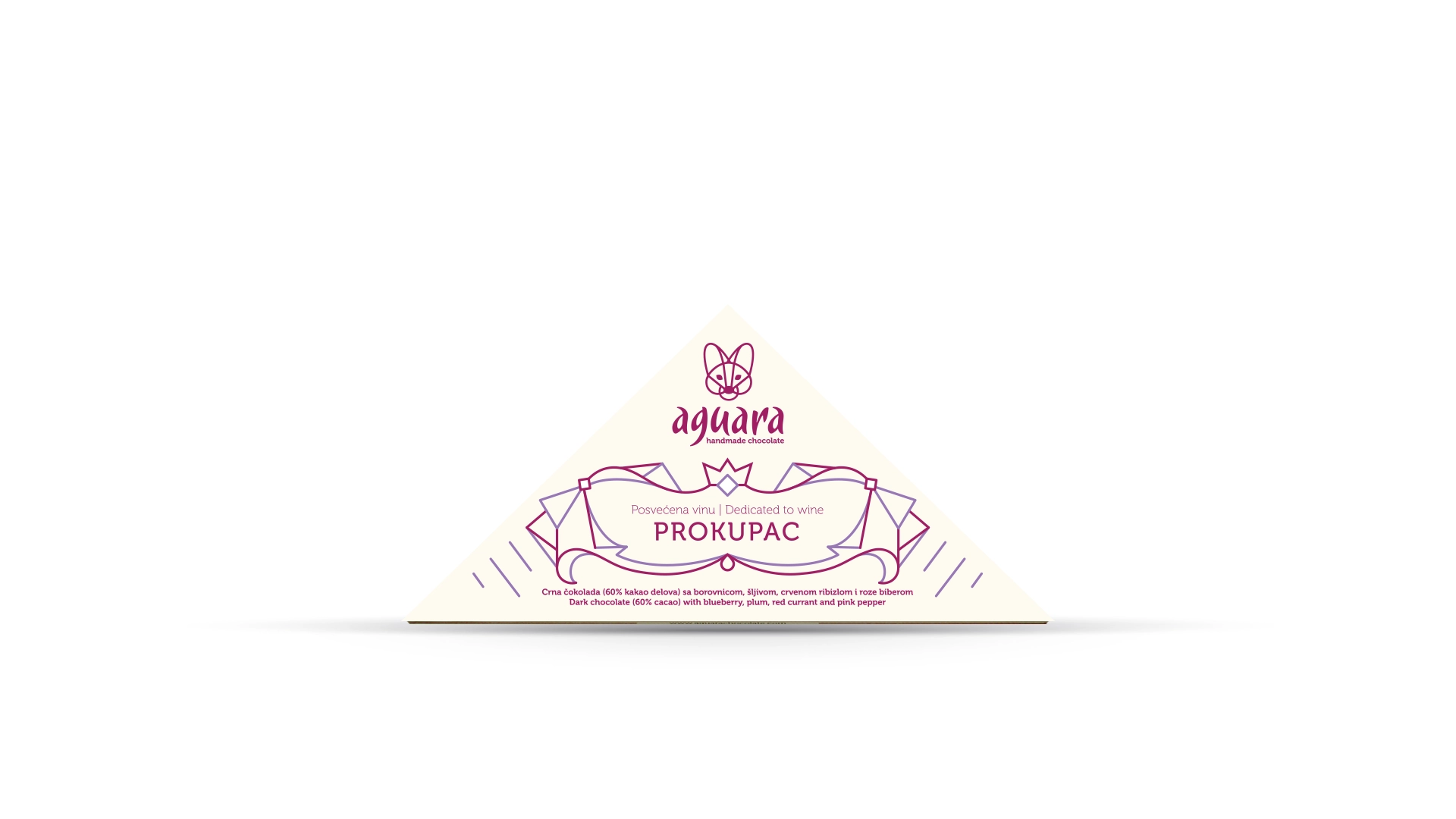 Trouglasta čokolada čokoladeposvećene vinu Prokupac. Na ambalaži se nalaze linijski elementi koji predstavljaju elemente srpske tradicije.